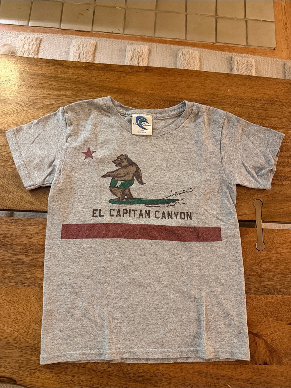 El Capitan Canyon Surfing Bear tee kids medium